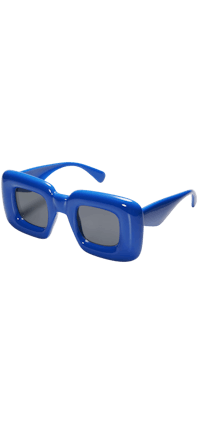 a pair of blue sunglasses on a black background