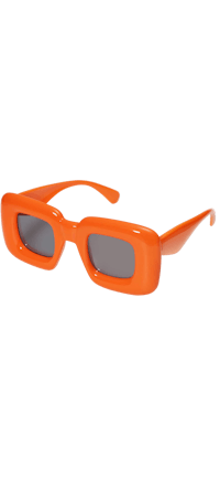a pair of orange sunglasses on a black background