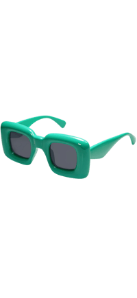 a pair of green sunglasses on a black background